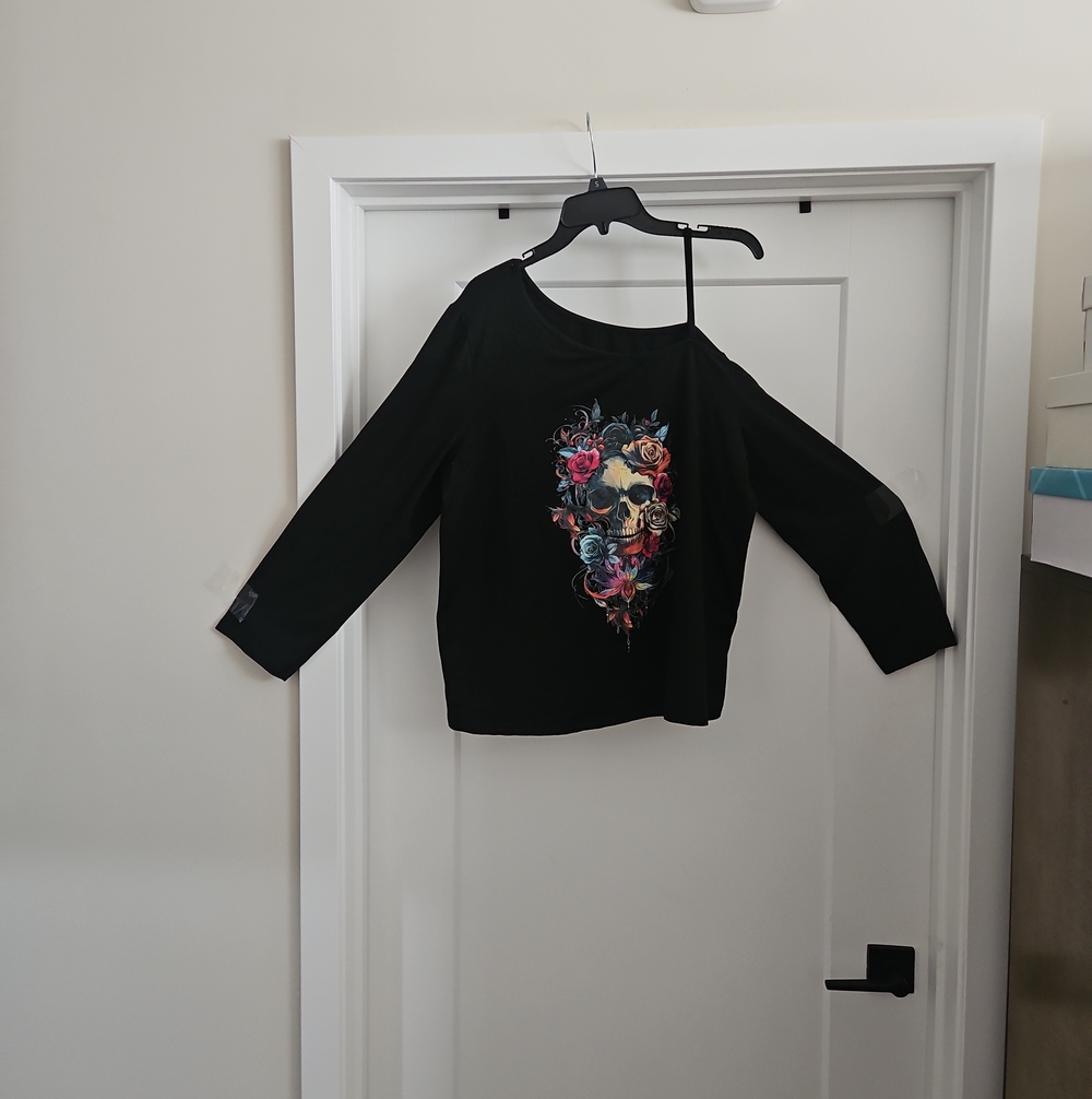 Women's Black Off-Shoulder Top with Floral Skull Graphic